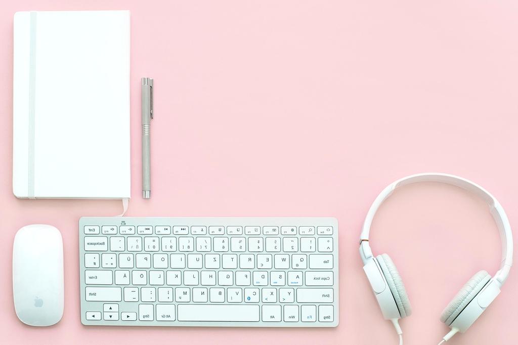 Contact page banner: modern office desk with communication devices